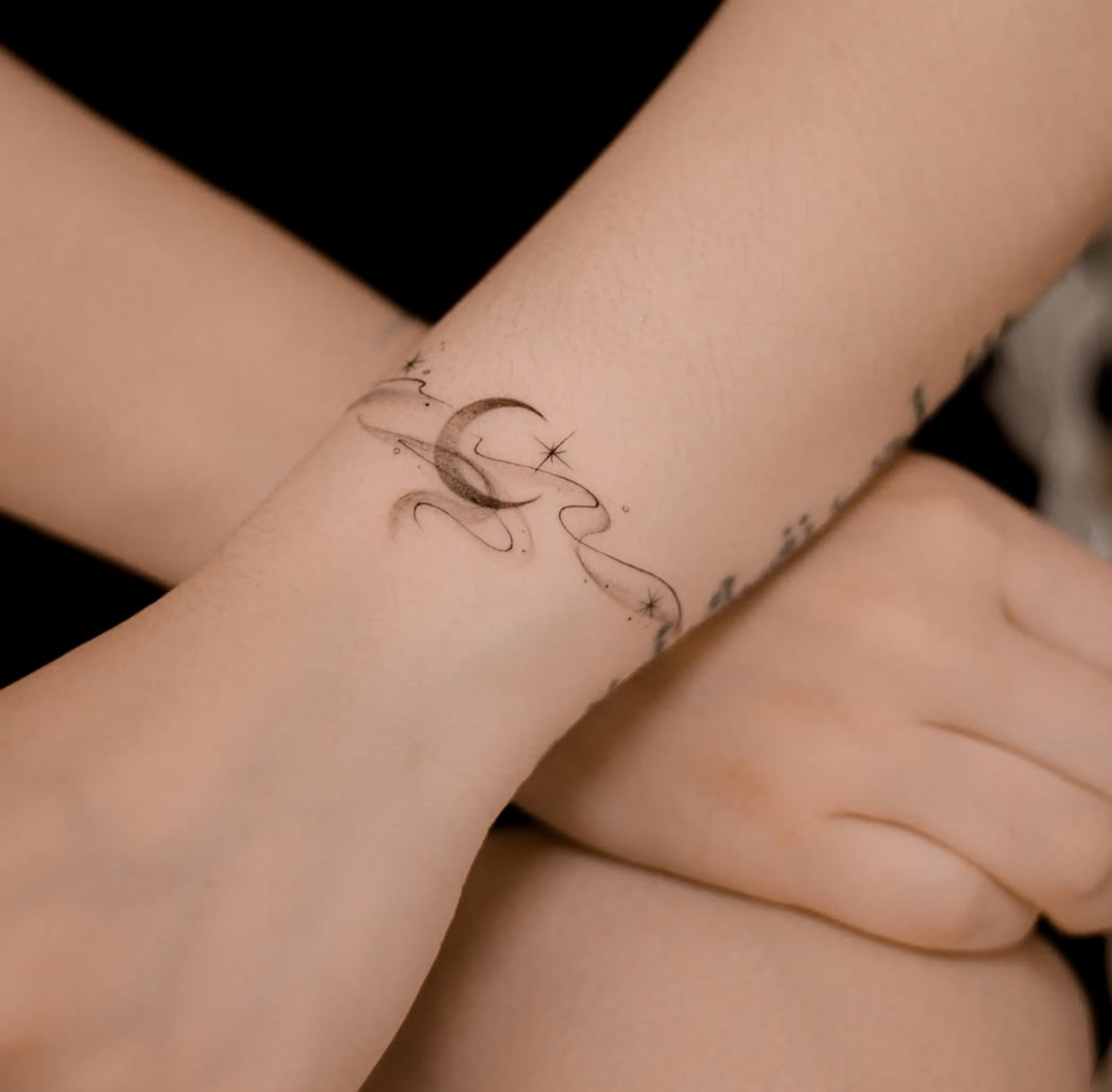 fine line tattoo touch ups